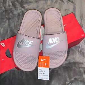 Brand new nike benassi slides.